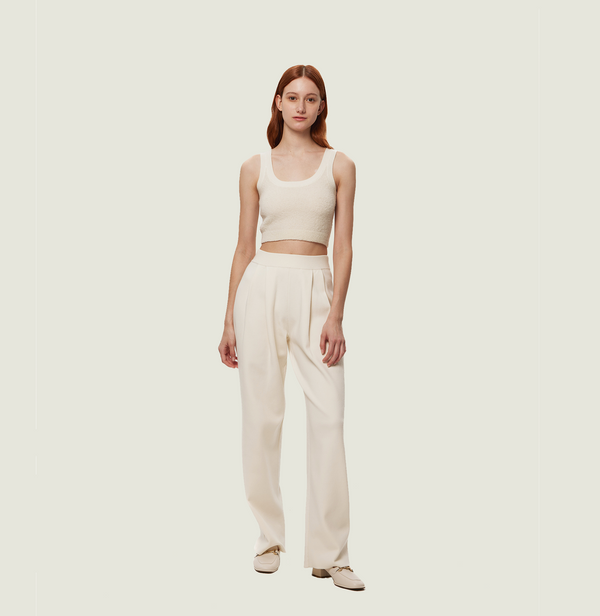 Wool pleated wide leg pants in white. front-view