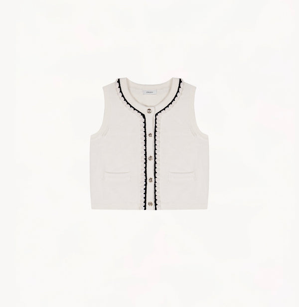 White wool-cashmere vest with hand-crocheted trim and pearl embellishments.