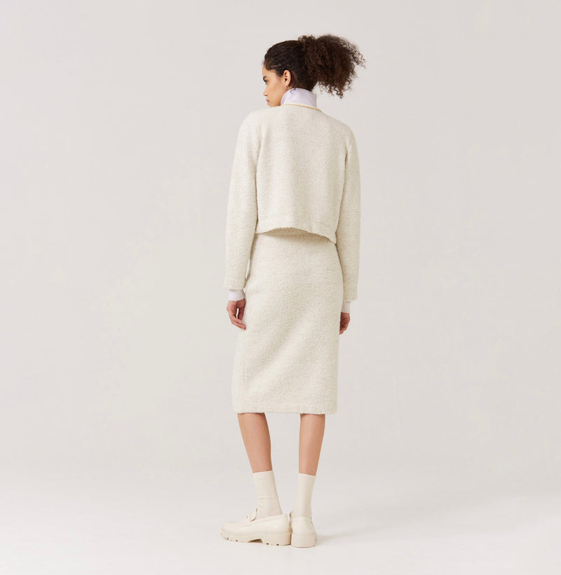 Tweed wool crewneck cardigan in white.