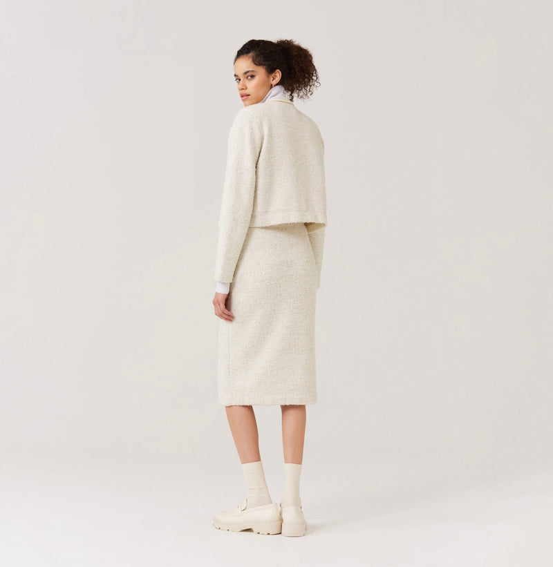 Tweed wool crewneck cardigan in white.