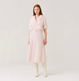 Cashmere puff sleeved cardigan with fur collar in light pink.