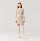 Wool boucle mini skirt in gingham green grey.
