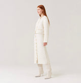 Wool quilted A-line skirt in white.