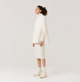 Quilted-knit cape in white. 