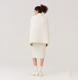 Quilted-knit cape in white. 