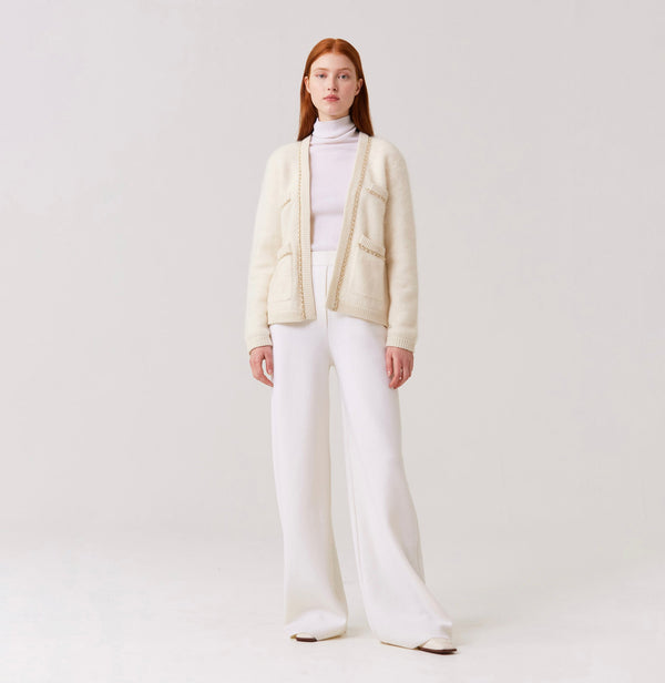 Cashmere open front cardigan with chain detailed pockets in white.