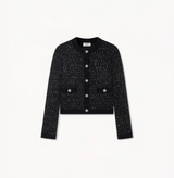 Sequined jacket with buttons in black.