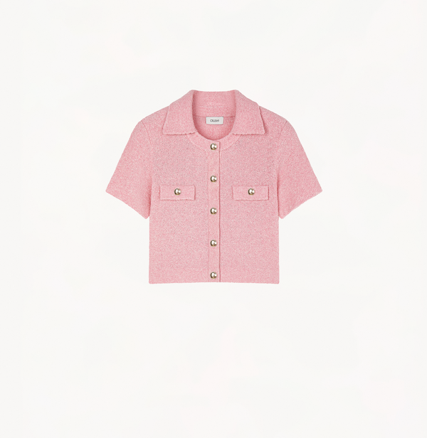 Bouclé jacket with short sleeves in pink.
