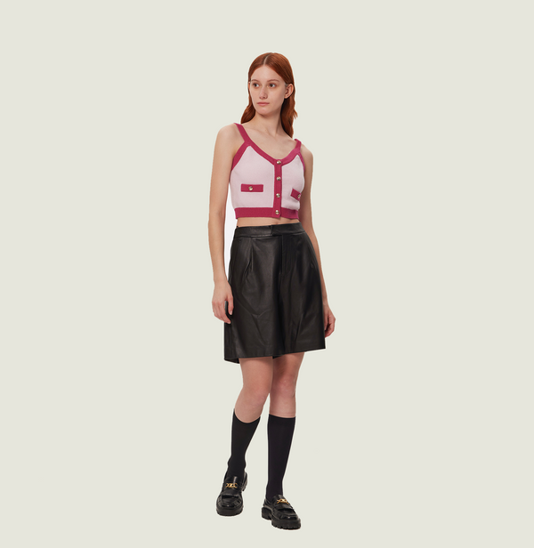 Cashmere button up tank top in pink and fushia colorblock. front-view