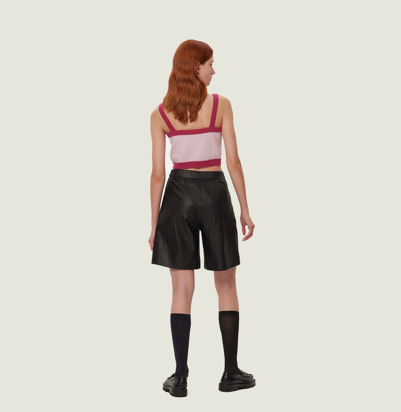Cashmere button up tank top in pink and fushia colorblock. rear-view