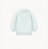 Cashmere puff sleeved cardigan with fur collar in mint green.