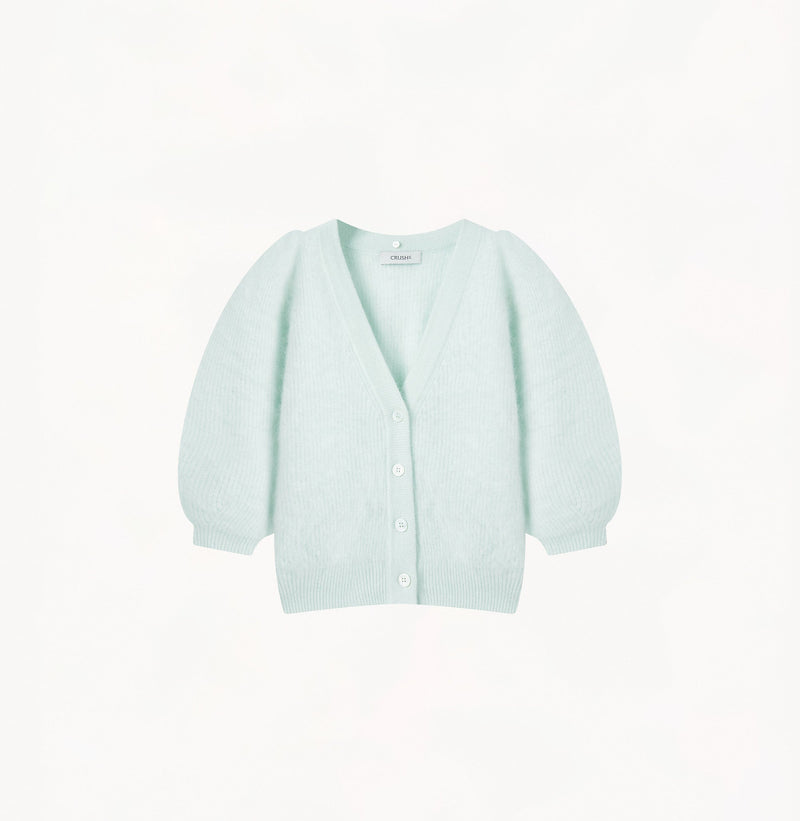Cashmere puff sleeved cardigan with fur collar in mint green.