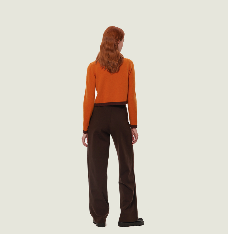 Cashmere colorblock cardigan in orange and brown with crewneck. rear-view