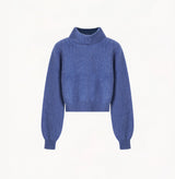 Cropped cashmere turtleneck sweater in blue.