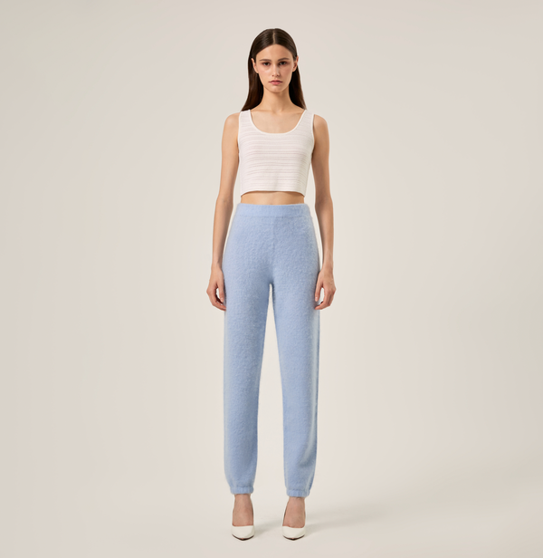 Cashmere women jogging pants in bright blue. front-view