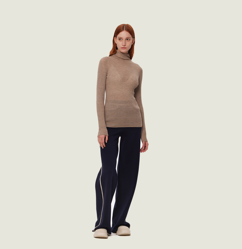 Cashmere ombre top in metallic champagne gold with turtleneck. front-view