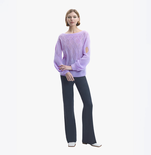 Sheer cable knit cashmere blouse with puff sleeves in light purple.