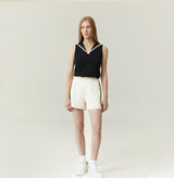 Color block shorts in beige. front-view