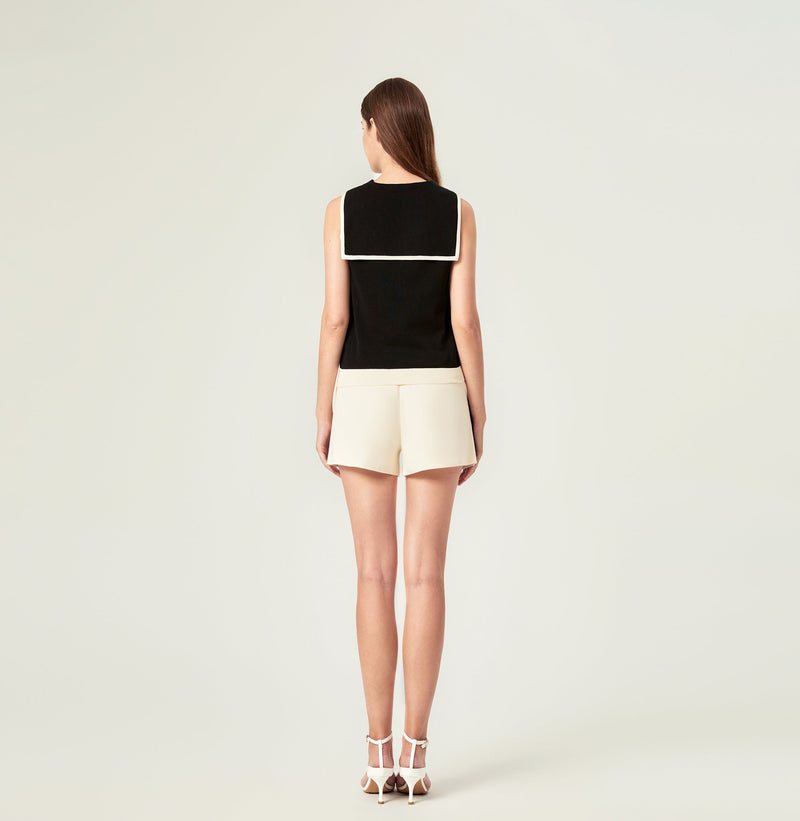 Color block shorts in beige. rear-view