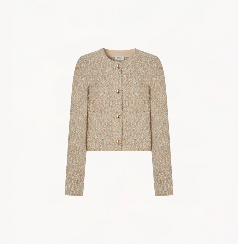 Boucle jacket in milk tea with pockets.