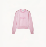 Embroidered fluffy cashmere sweater in pink.