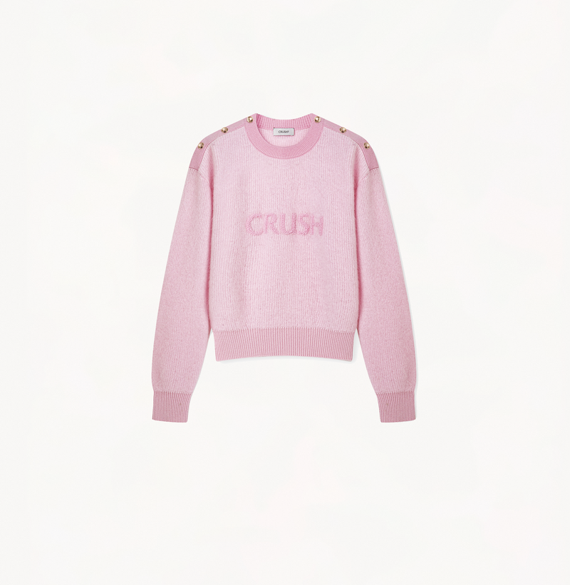 Embroidered fluffy cashmere sweater in pink.