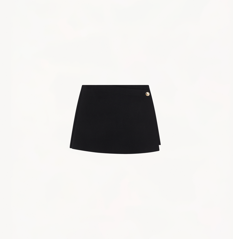 Wrap skort with gold buttons in black.