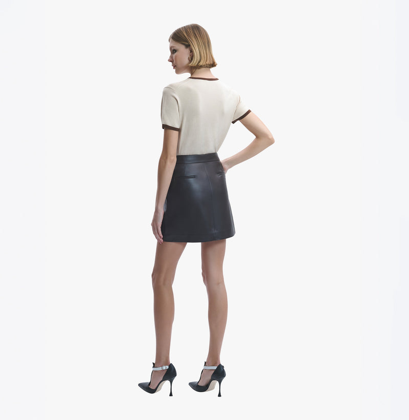 Lambskin leather A-line skirt with front metal buttons in americano.