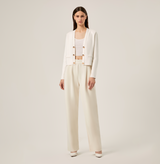 Cropped wide-leg flare suit pants in white. front-view