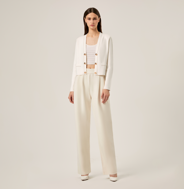 Cropped wide-leg flare suit pants in white. front-view