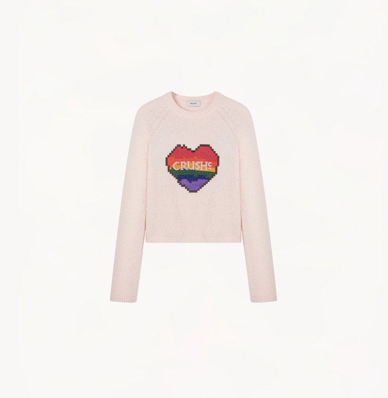 Colorblocked sweater with a heart in light pink.