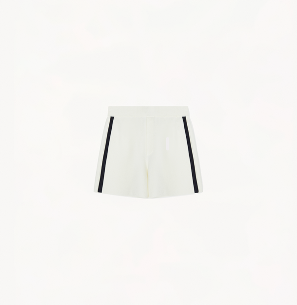 Trimmed shorts in white with black stripe.