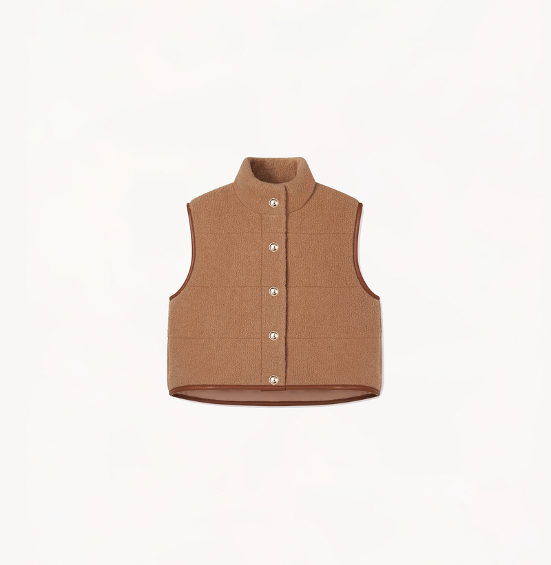 Women's quilted vest with a stand collar in camel.