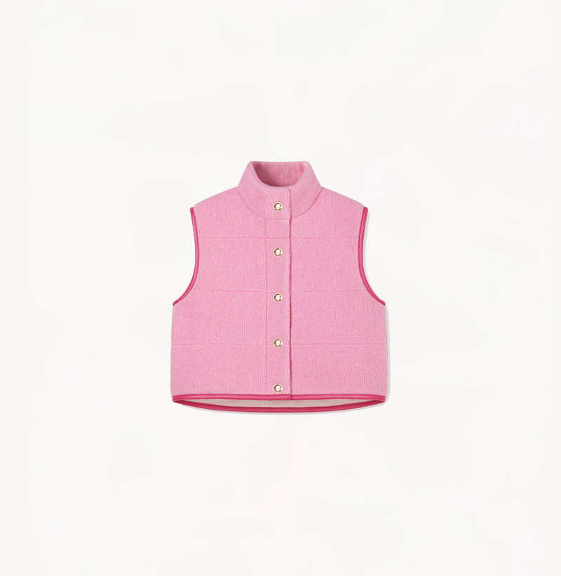 Women's quilted vest with a stand collar in orchid.