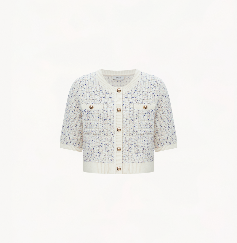 Wool boucle cardigan sweater in white with short sleeve.