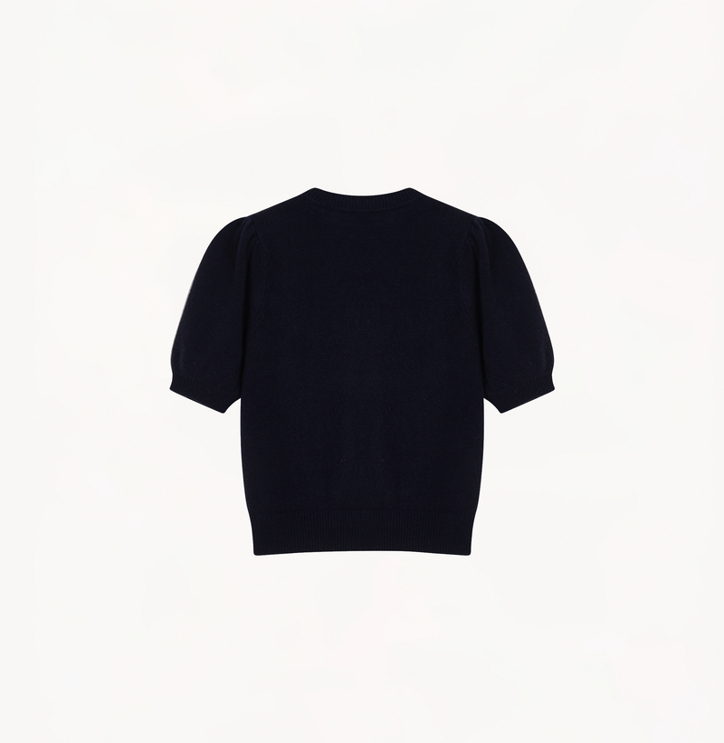 Wool pointelle knit sweater in navy blue with balloon sleeves.