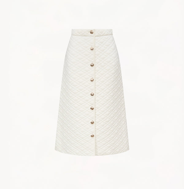 Wool quilted A-line skirt in white.