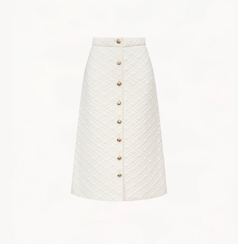 Wool quilted A-line skirt in white.