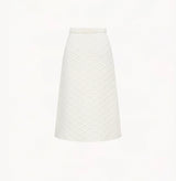 Wool quilted A-line skirt in white.