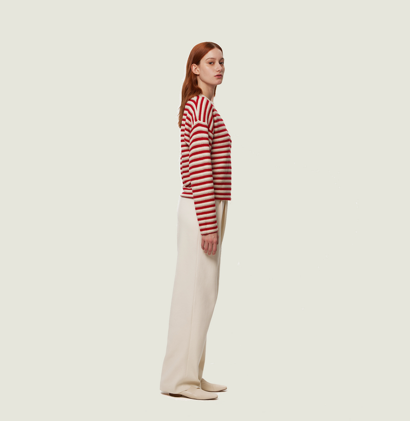 Wool stripped sweater in red and white jacquard stripes. right-view