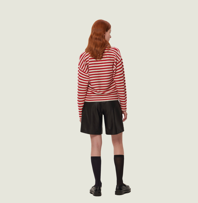 Wool stripped sweater in red and white jacquard stripes. rear-view