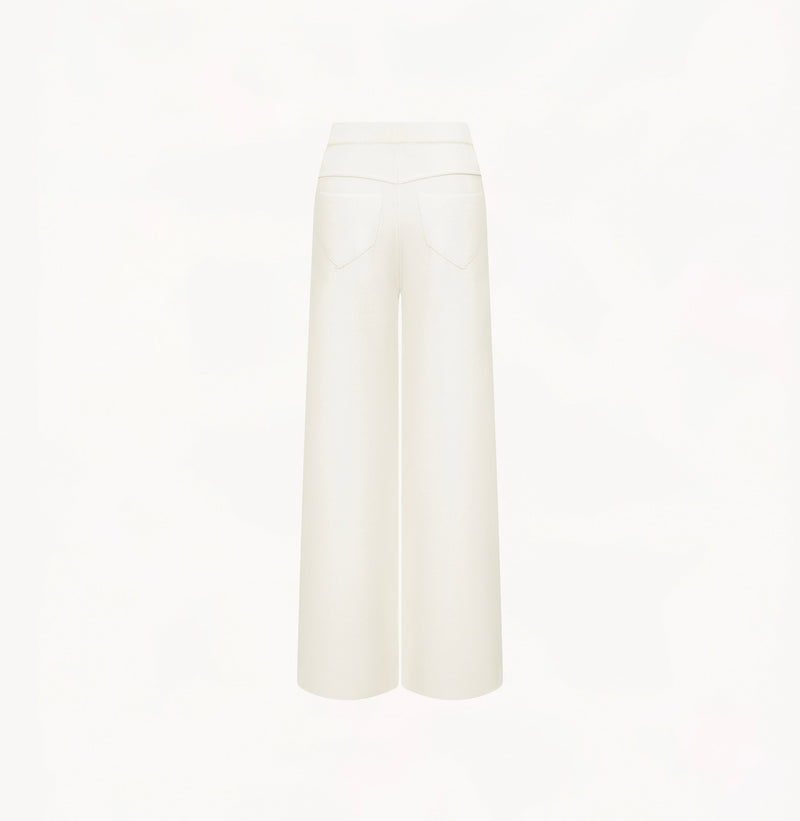Wool wide leg pants with high waist in white.